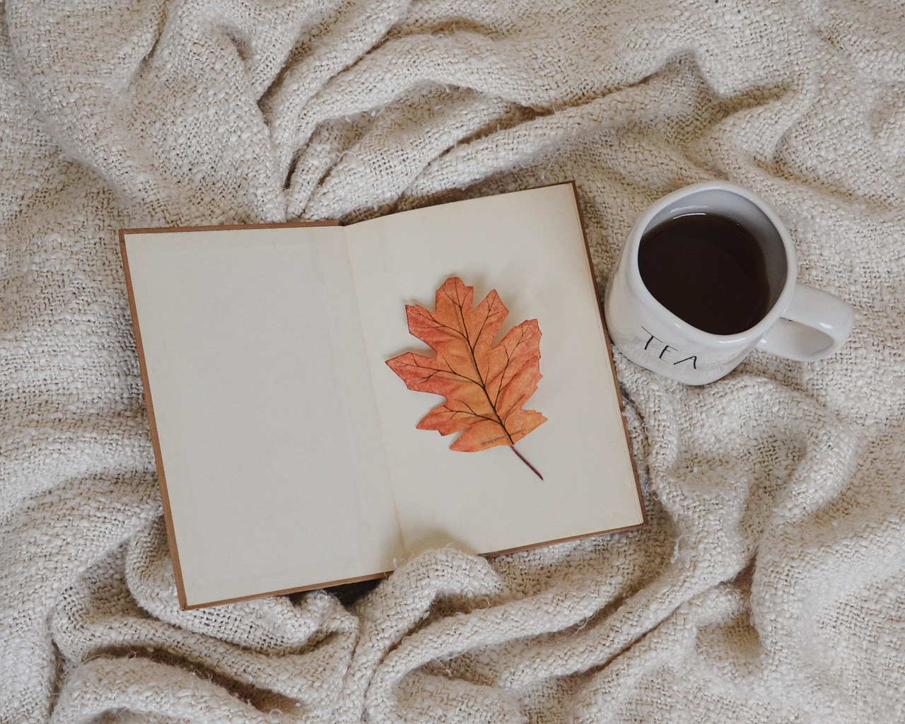 journal and tea setup to help break the cycle of overthinking at night