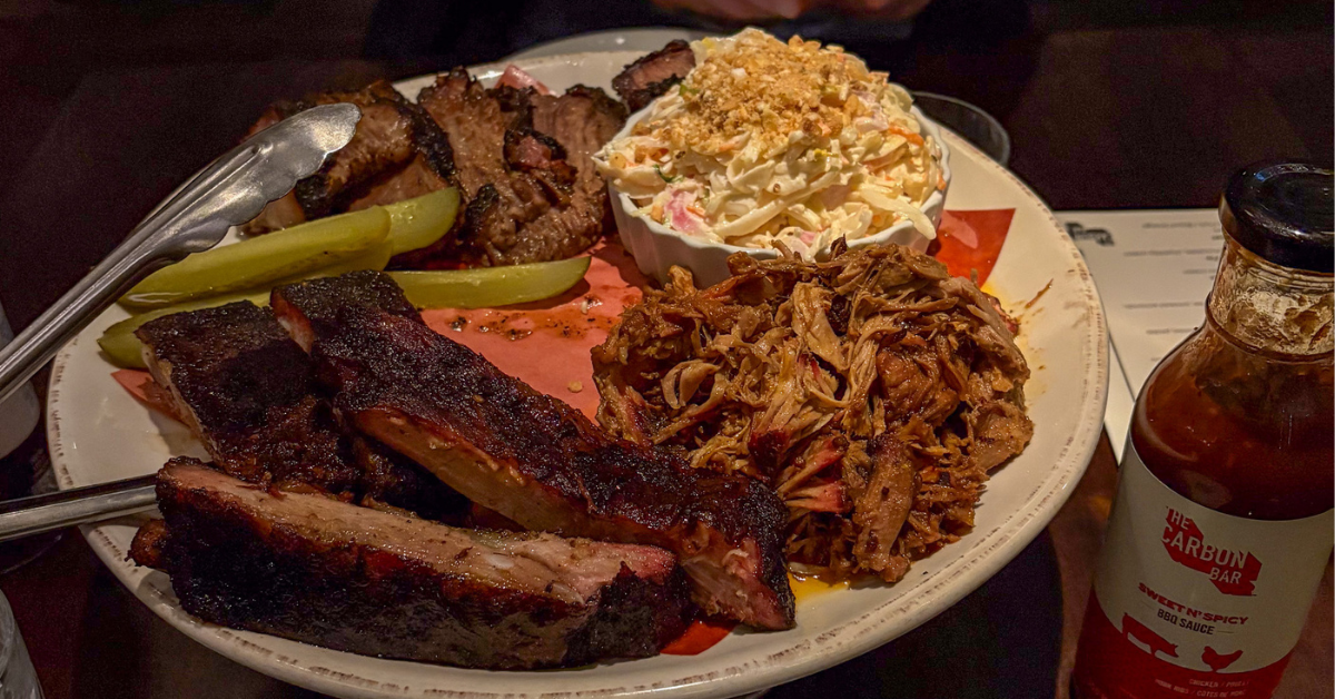 Private-dining-Toronto-Carbon-Bar-large-meat-platter-brisket-ribs-coleslaw
